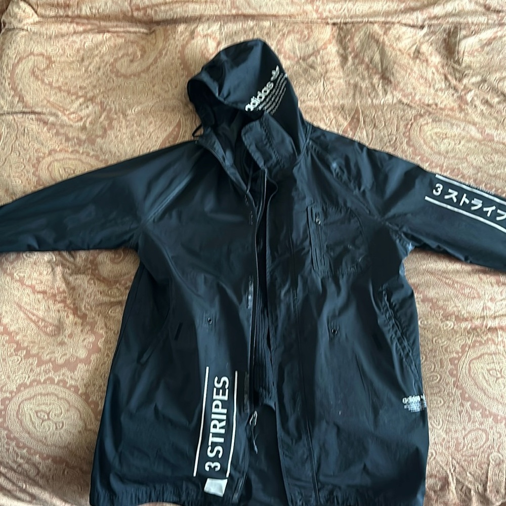 This is a one of a kind adidas trench coat. Very good condition.